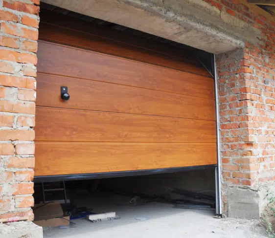 Garage door with bottom seal