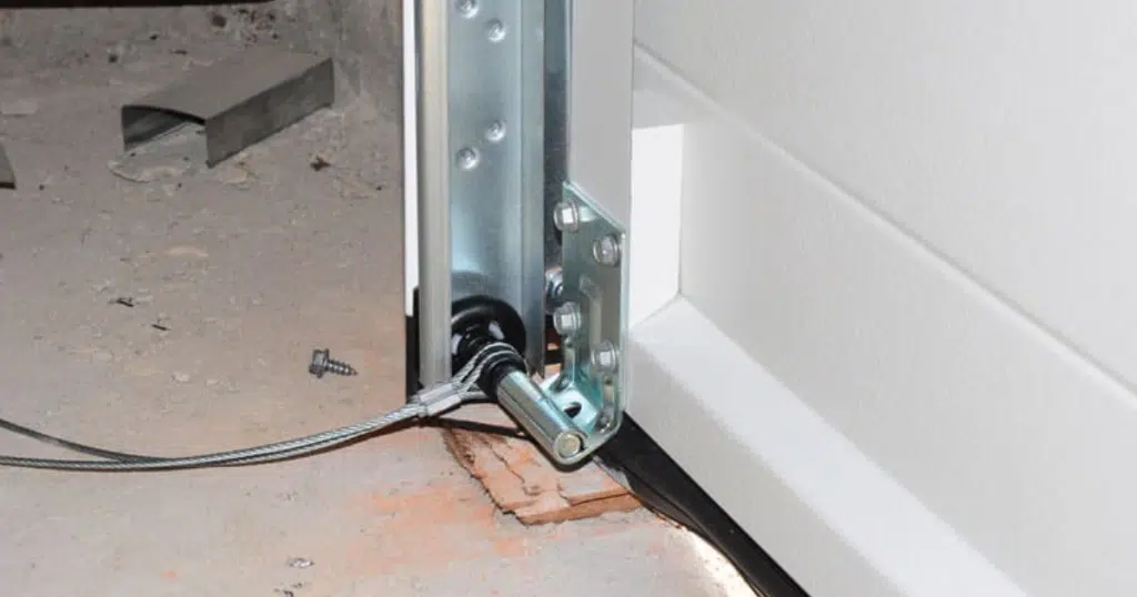 Close-up of garage door cable end