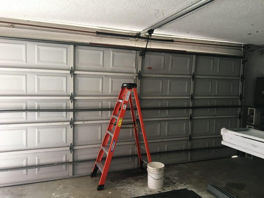 Can a damaged garage door be repaired?