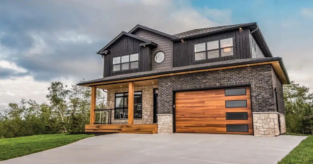 modern home with wooden garage doors