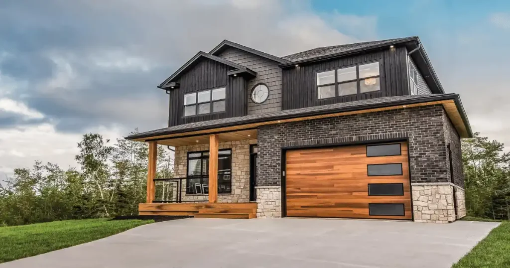 modern home with wooden garage doors